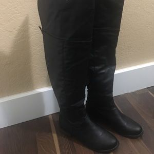 Over the knee black boots